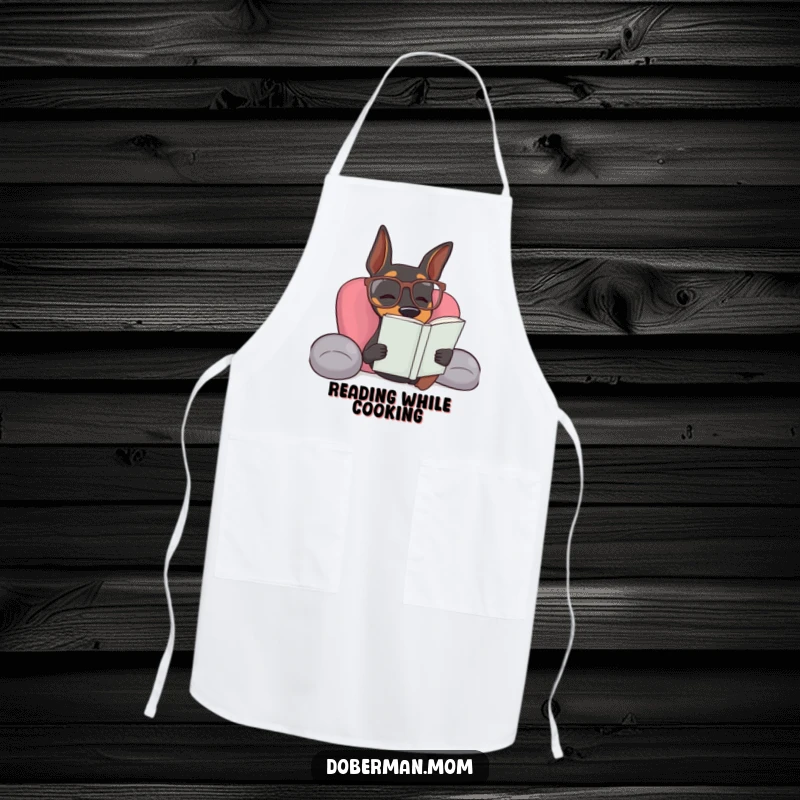Funny Doberman dog wearing reading glasses, ready for a relaxing moment in this humorous apron.