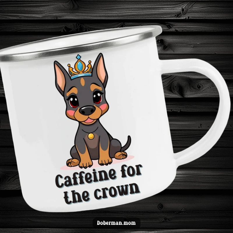 Funny Doberman dog wearing a tiara, posing regally on a sturdy camping mug, ready for outdoor adventures with humor.