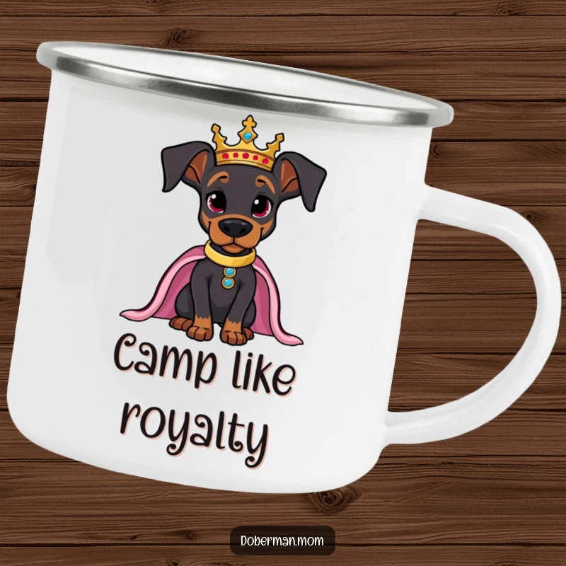 Funny camping mug featuring a regal Doberman wearing a crown, posing confidently for outdoor sipping.