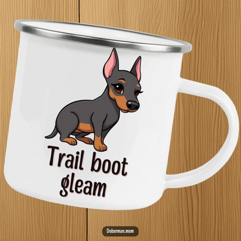 Funny Doberman camping mug with a winking dog presenting a polished boot, ideal for outdoor enthusiasts.