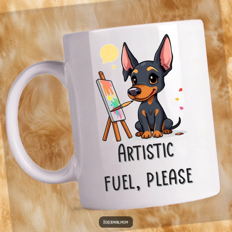 Funny Doberman artist mug showing a dog with a paintbrush creating a colorful abstract masterpiece, embodying creativity.