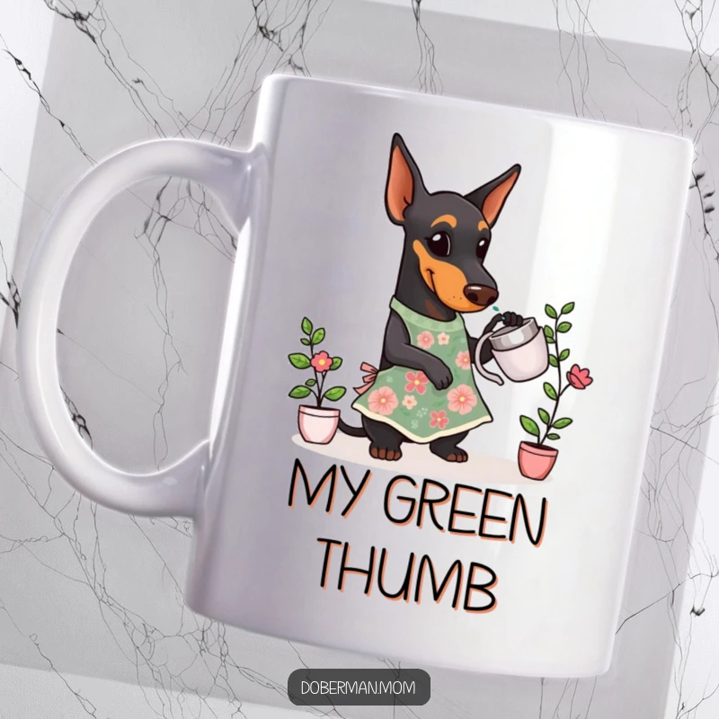 Funny Doberman Gardener Mug showing a Doberman dog wearing a floral apron, carefully watering a small, healthy plant.