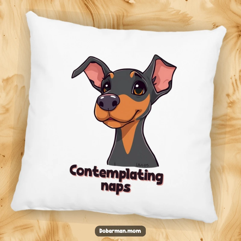 Funny Doberman pillow with a plush design of a dog tilting its head curiously, offering comfort and humor.