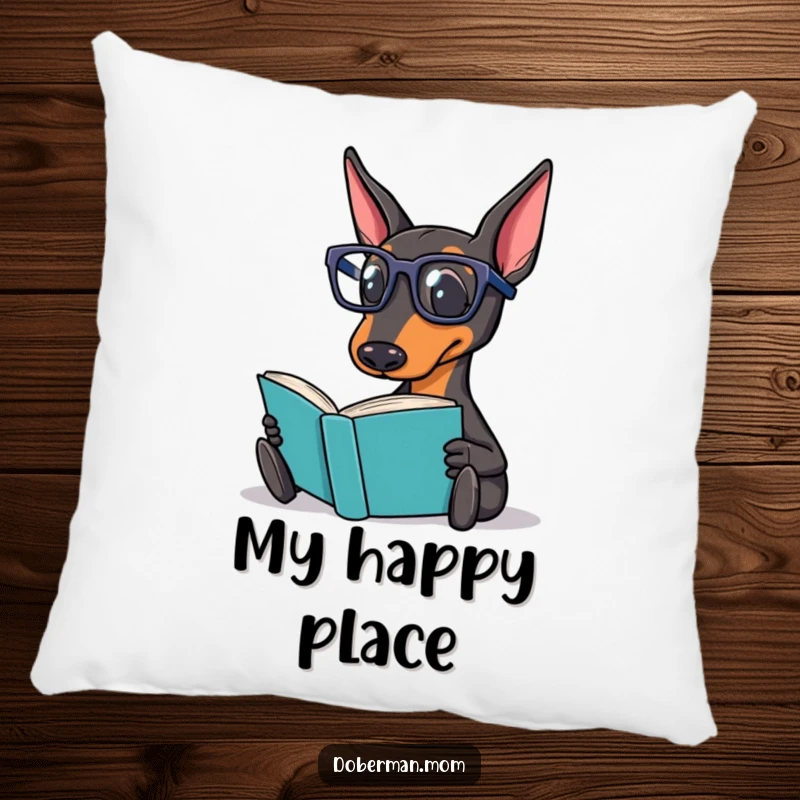 Funny Doberman Pillow showcasing a distinguished Doberman dog wearing reading glasses, deeply absorbed in reading a book.