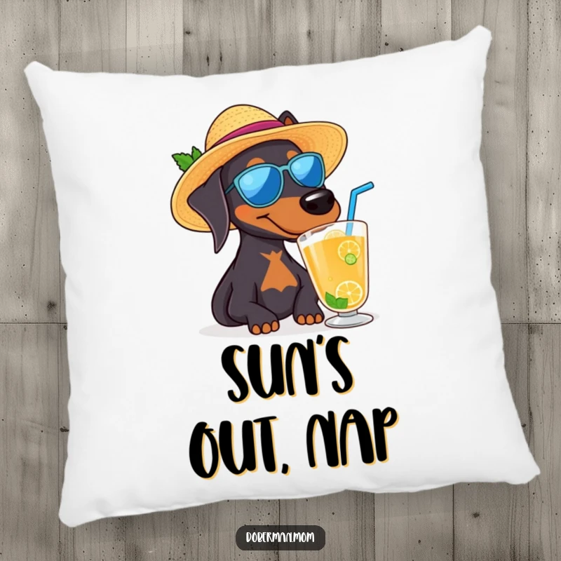 Funny Doberman dog wearing a sun hat and sipping a drink, a plush and humorous pillow.