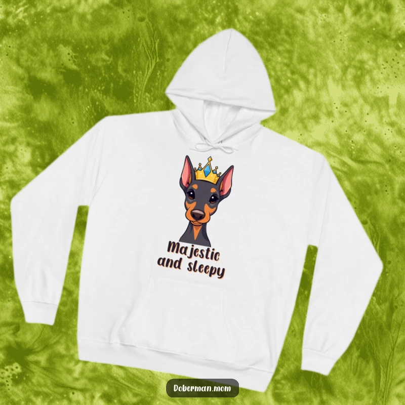 Funny Regal Doberman hoodie adorned with a small, jeweled crown, offering majestic comfort and a touch of humorous canine royalty.
