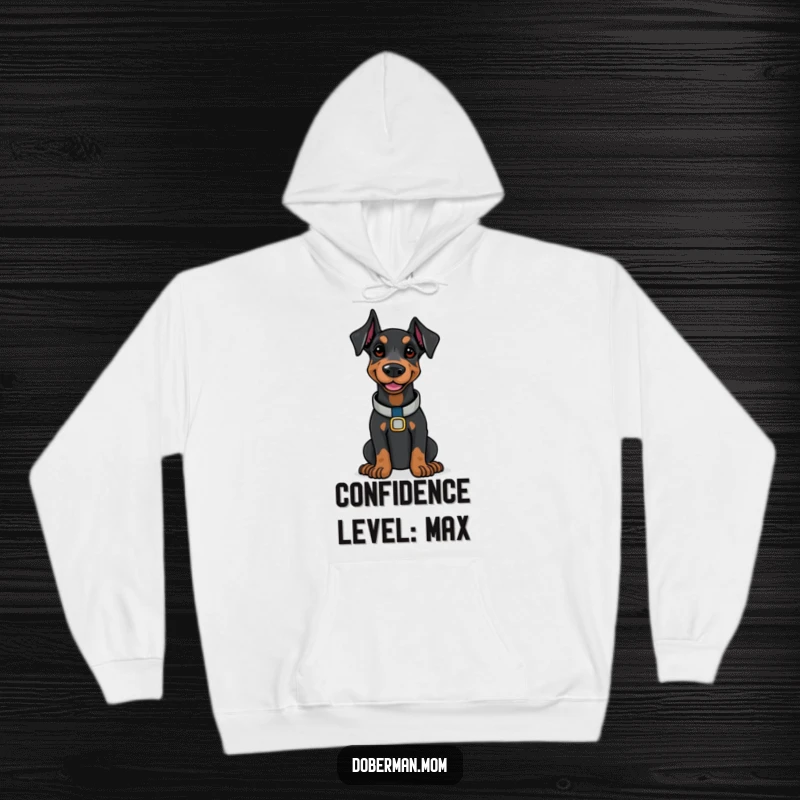 Doberman wearing a polished collar, with a quiet confident smile, depicted on a cozy hoodie.