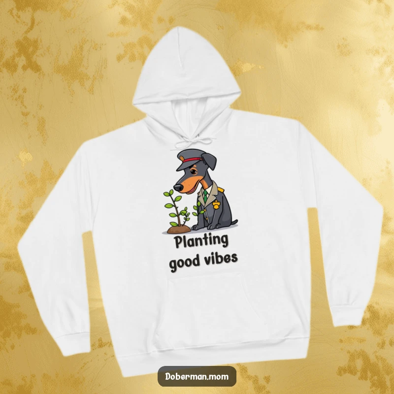 Uniformed Doberman gently tending a tiny sapling, depicted on a cozy and funny hoodie.