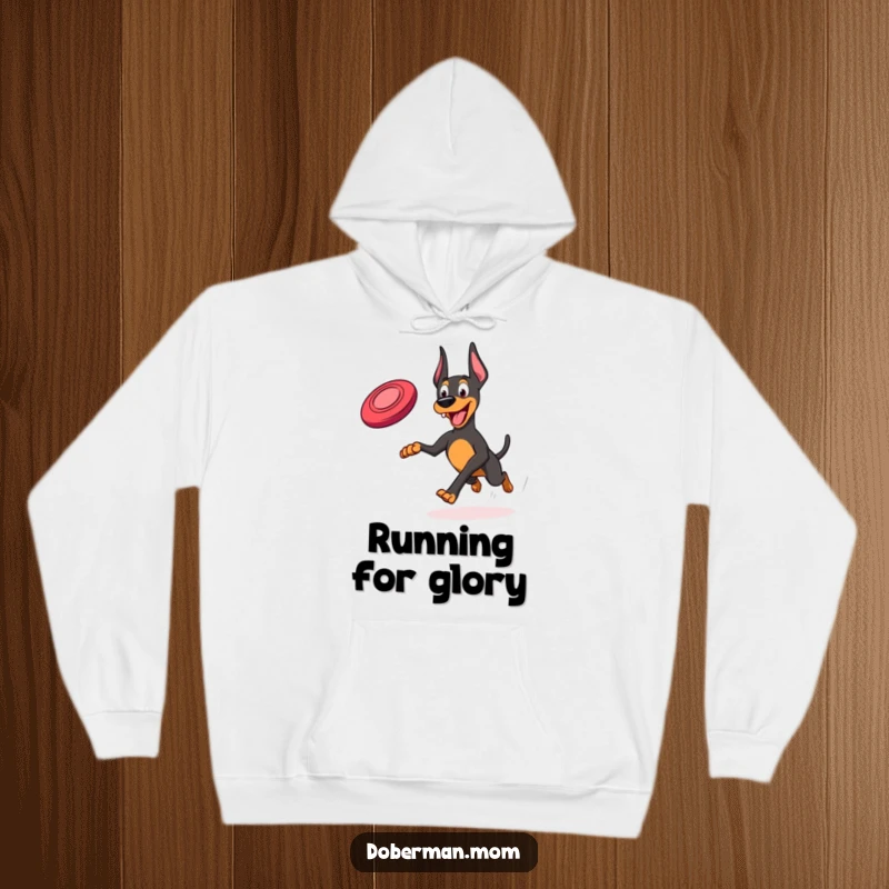 Funny Frisbee Doberman Hoodie: A comfortable hoodie featuring a Doberman joyfully running after a frisbee.