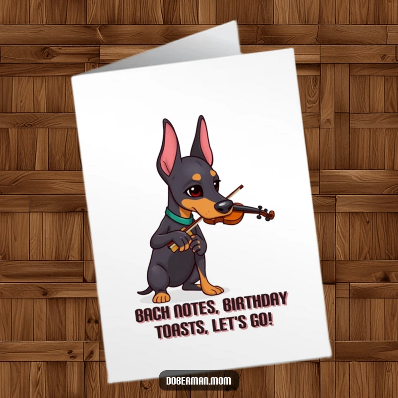 Funny Free Printable Birthday Card: Doberman playing a tiny violin with a comically serious expression.