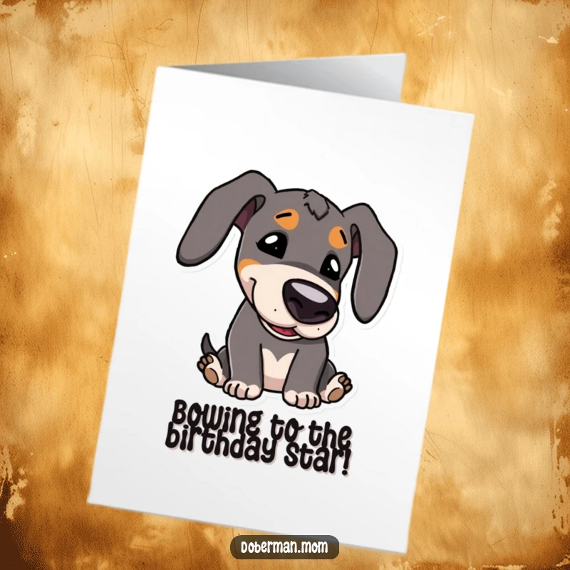 Funny Free Printable Birthday Card: Kawaii Doberman character playfully bowing its head in a cute birthday greeting.