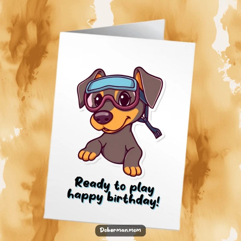 Funny Free Printable Birthday Card: A Doberman wearing tiny sports goggles, looking eager and ready for an adventurous birthday game.