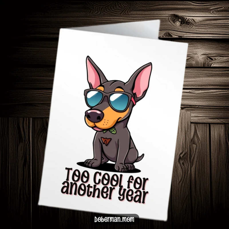 Funny Free Printable Cool Doberman Birthday Card: A Doberman dog wearing sunglasses poses confidently, exuding birthday coolness.