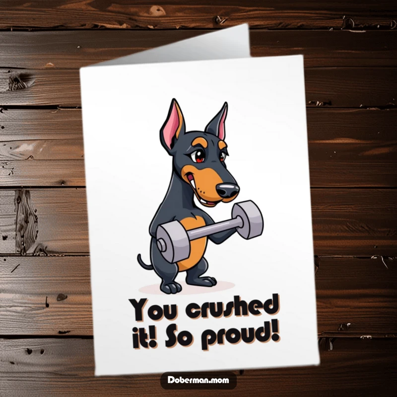 Funny free printable Doberman congratulations card, a strong dog winking while holding a small training dumbbell, celebrating success.