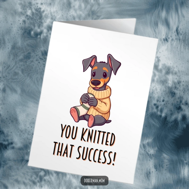 Funny Free Printable Congratulations Card: A Doberman in a sweater knitting a tiny sock, celebrating an achievement with care.