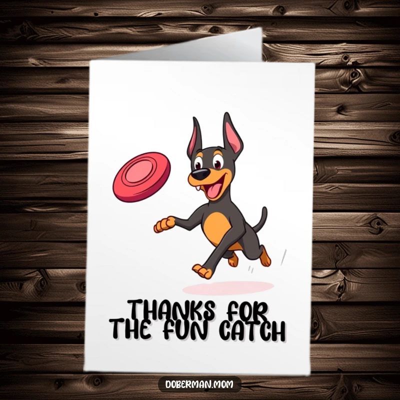 Funny Free Printable Thank You Card: A Doberman happily running with a frisbee, conveying thanks with dynamic energy and a joyful spirit.