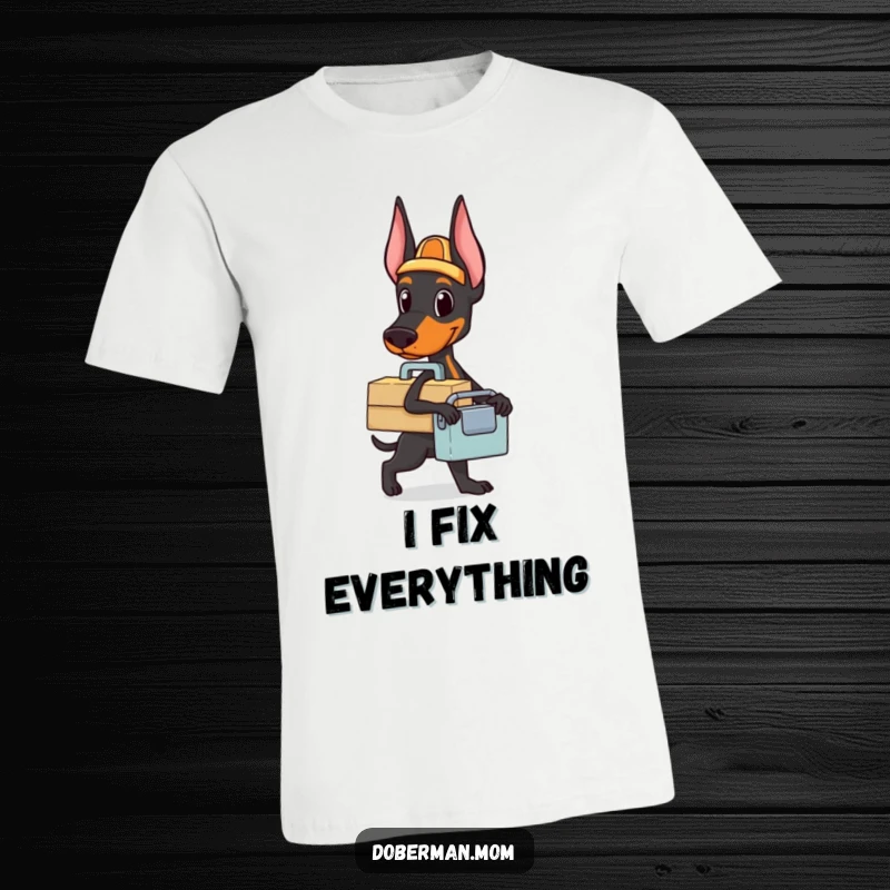 Funny Doberman toolbox t-shirt featuring a dog holding a small toolbox, ready for a task, perfect for DIY lovers.