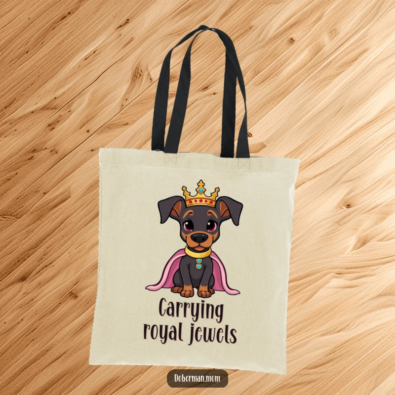 Funny tote bag featuring a majestic Doberman wearing a crown, exuding confidence and style.